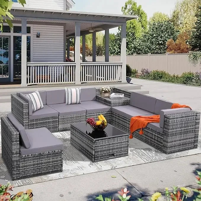 Eight Piece Outdoor Grey Rattan Patio Set With Glass Table And Hidden Storage